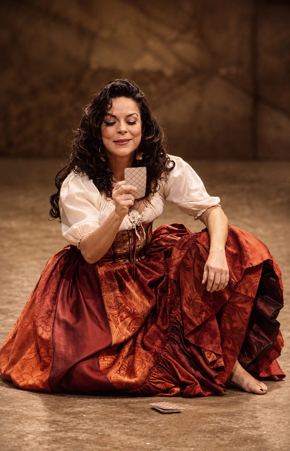 As Carmen in the card scene