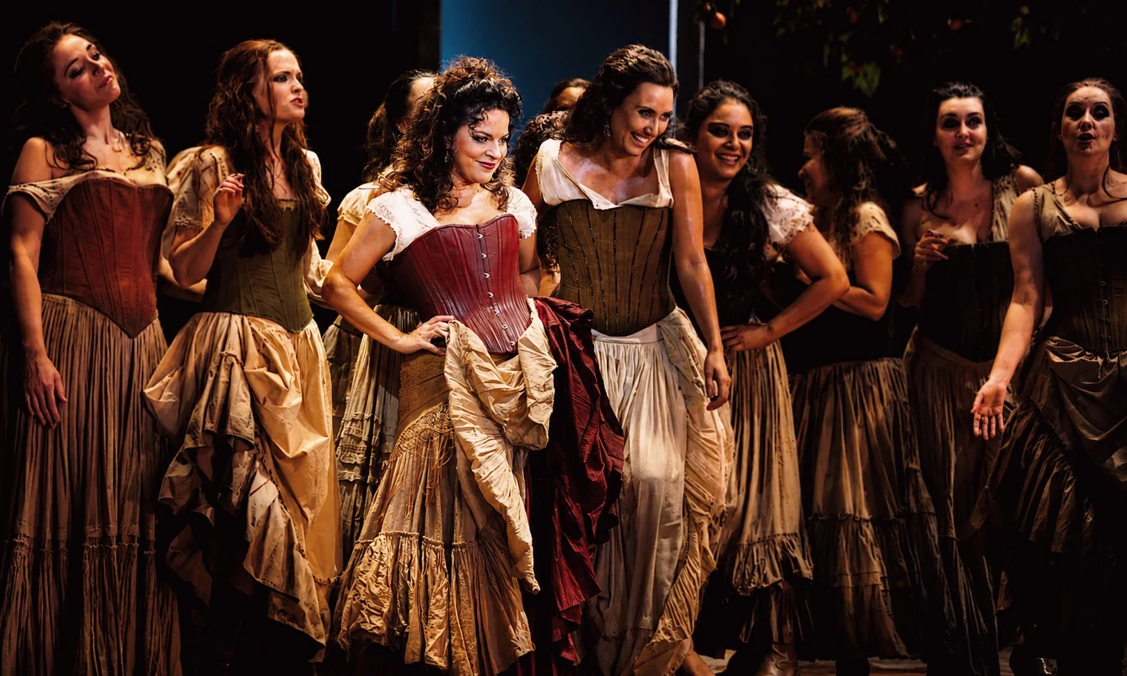 Nancy Fabiola Herrera on stage with the ensemble